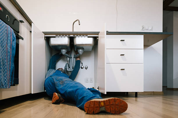 Professional Drain Cleaning technician working in Raymondville, TX